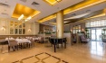 Comfortable chairs in classic English style in the main hall of the restaurant